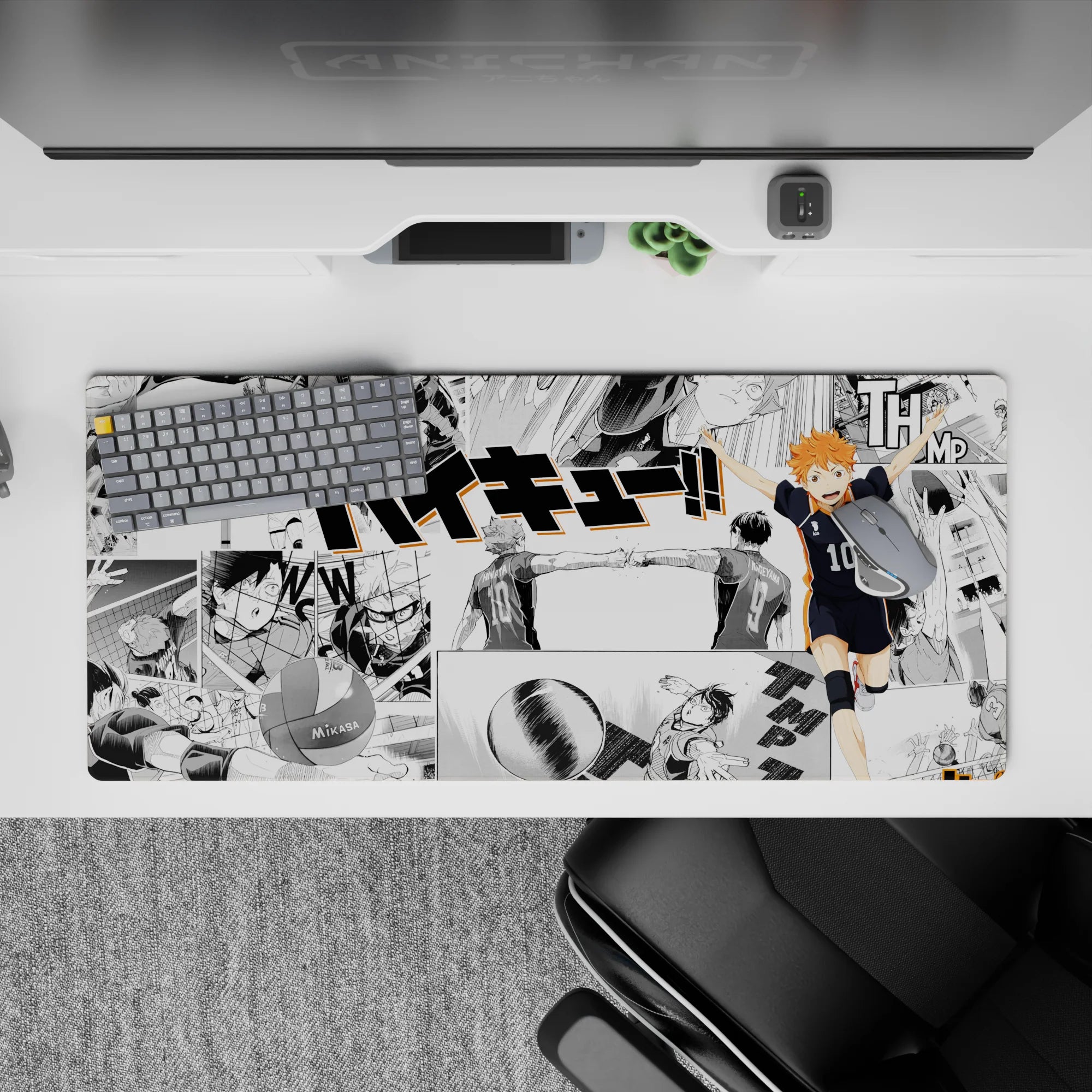 High-energy orange-and-black anime desk pad 36x16 inches, crisp manga panels and rally vibe.
