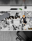 40x20 inches anime desk pad with bright orange hair pop on crisp black-and-white collage, high-energy vibe.