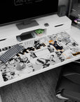 40x20 inches Haikyuu desk pad showing Hinata lunging forward, arms wide, with Kageyama serve panels behind.