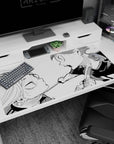40x20 inches anime desk pad showing two characters inches apart yelling, sweat flying, chain between them.