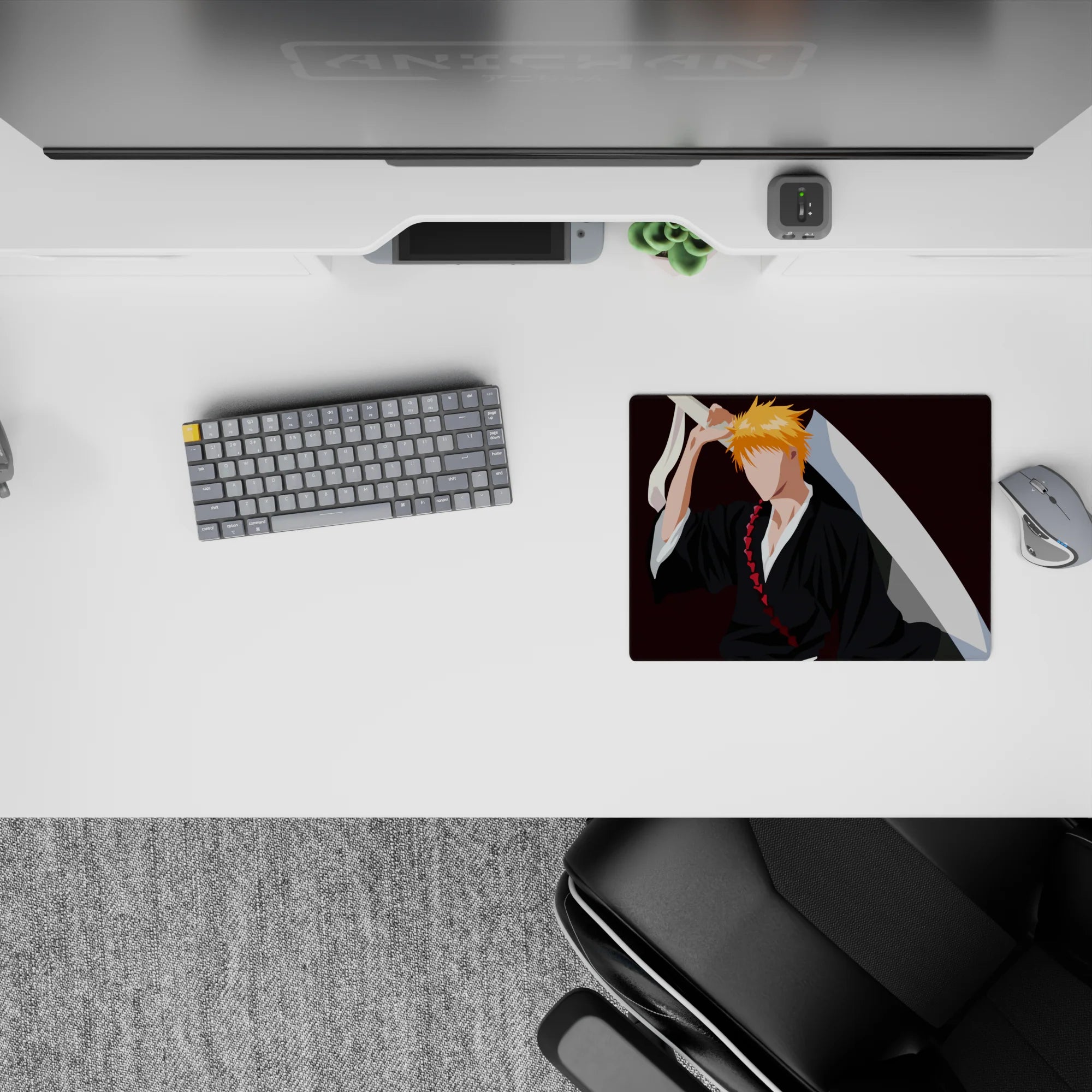 Anime mouse pad 14x10 inches features Ichigo Kurosaki silhouette from Bleach with black robes and orange hair on burgundy.