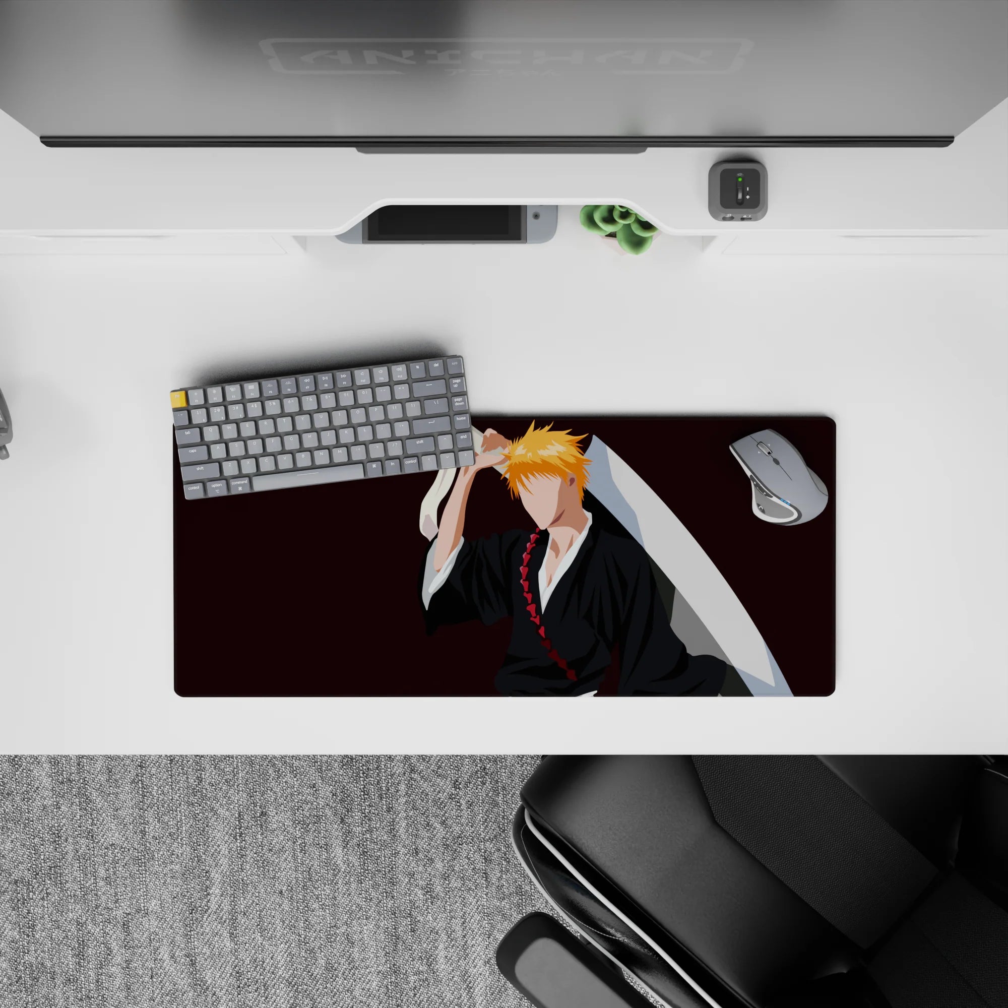 Ichigo Kurosaki silhouette on 28x12 inch anime mouse pad from Bleach with black robes, orange hair, burgundy background.