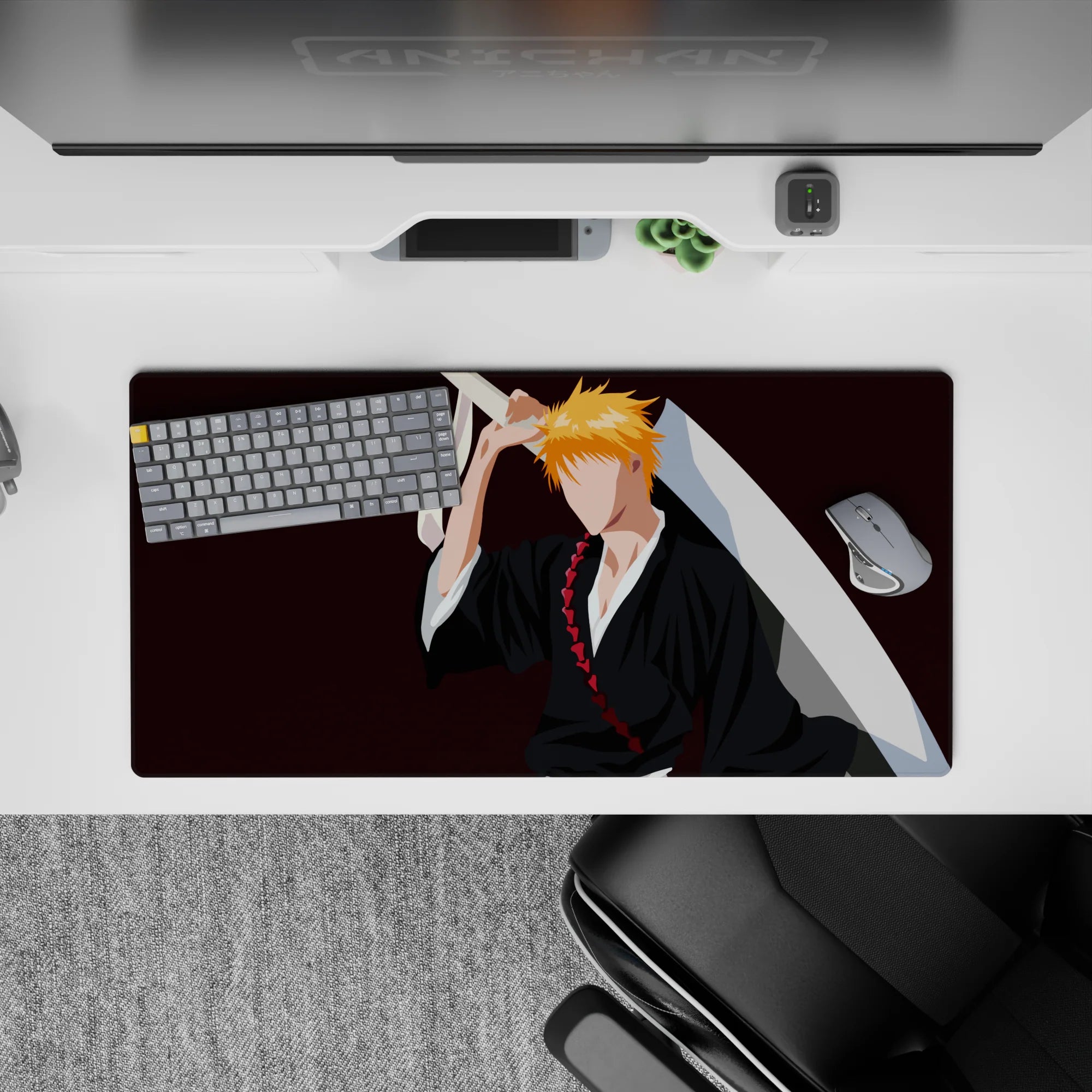 Ichigo Kurosaki silhouette on 32x16 inch mouse pad from Bleach, black robes, orange hair, Zangetsu, burgundy backdrop.