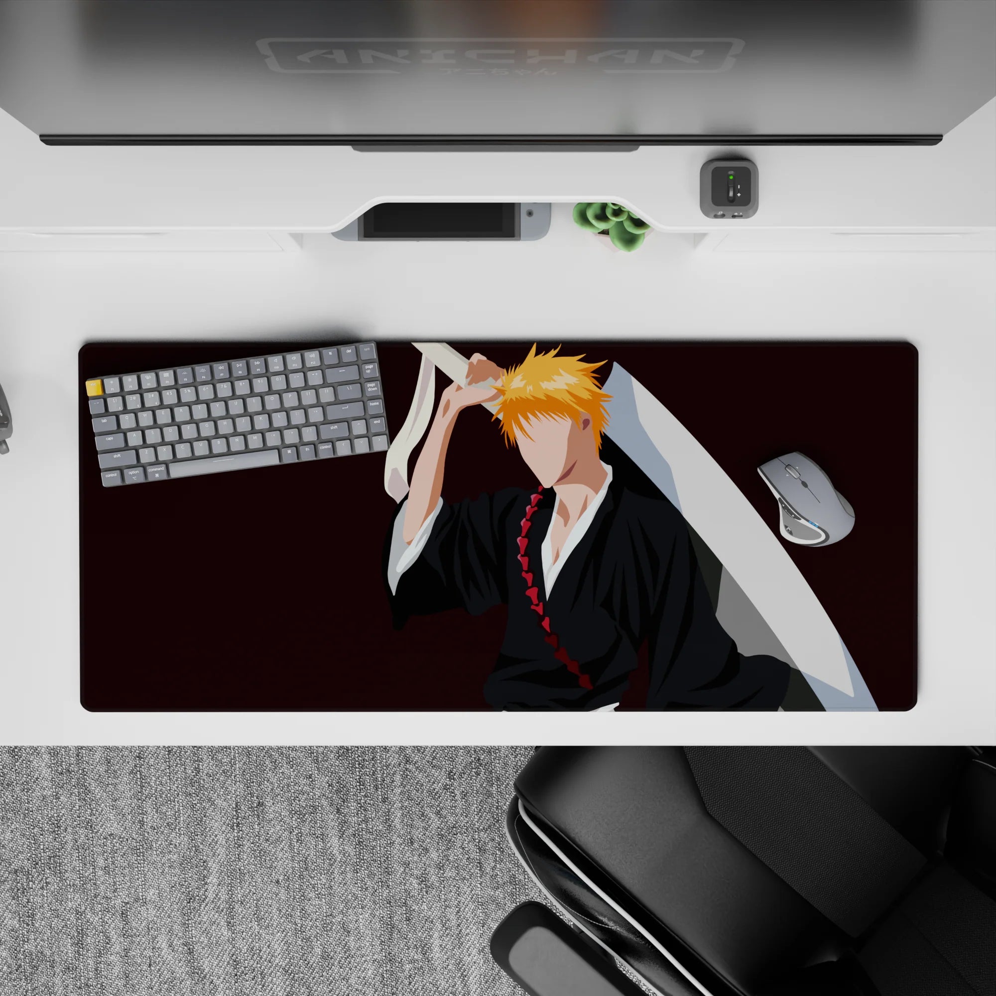 Ichigo Kurosaki silhouette on 36x16 inches anime desk pad, black robes, orange hair, Zangetsu sword, from Bleach.