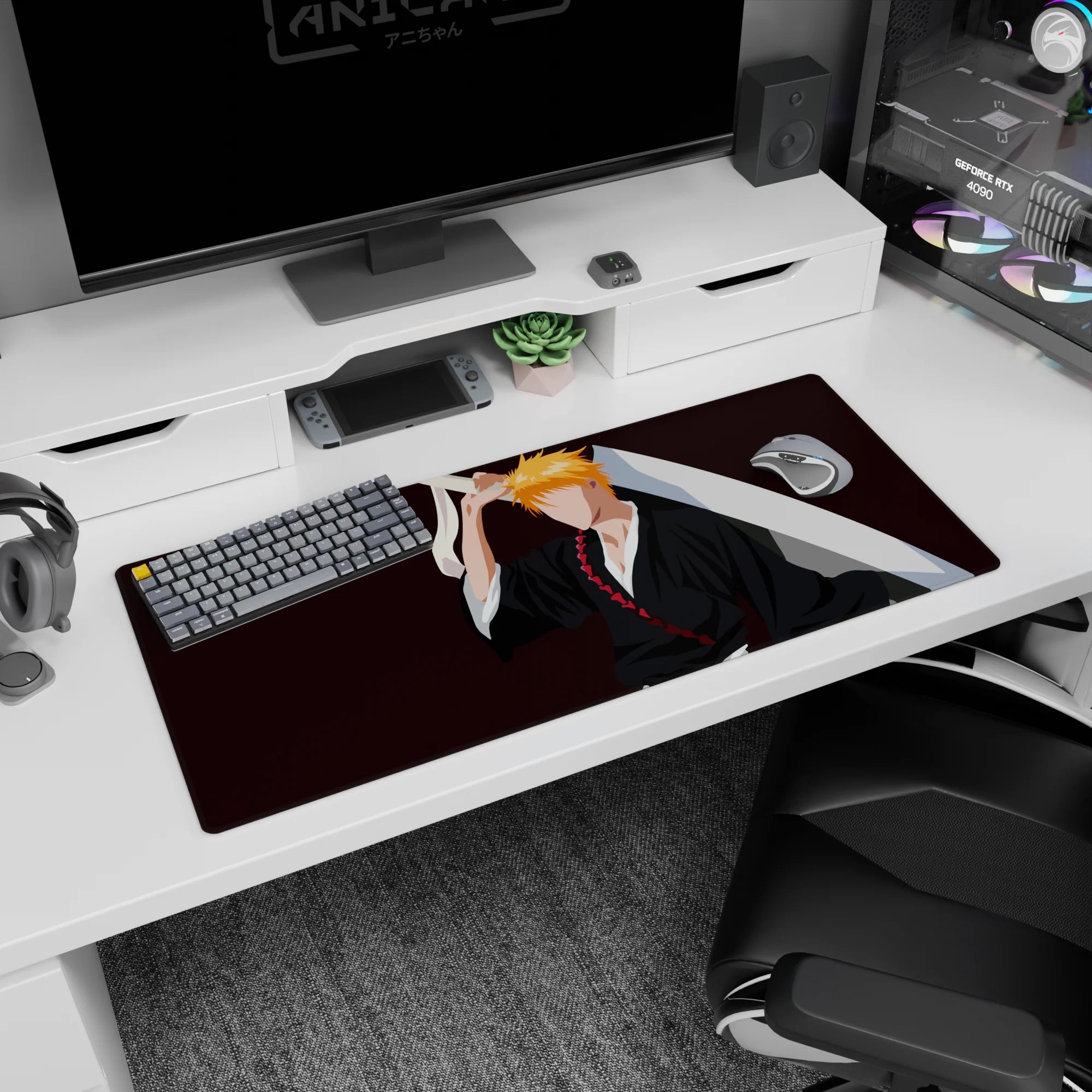 Anime desk pad 36x16 inches featuring Ichigo Kurosaki silhouette from Bleach; black robes, orange hair, and Zangetsu.