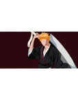 Anime desk pad 36x16 inches featuring Ichigo Kurosaki's silhouette from Bleach, with black robes and orange hair on a burgundy backdrop.