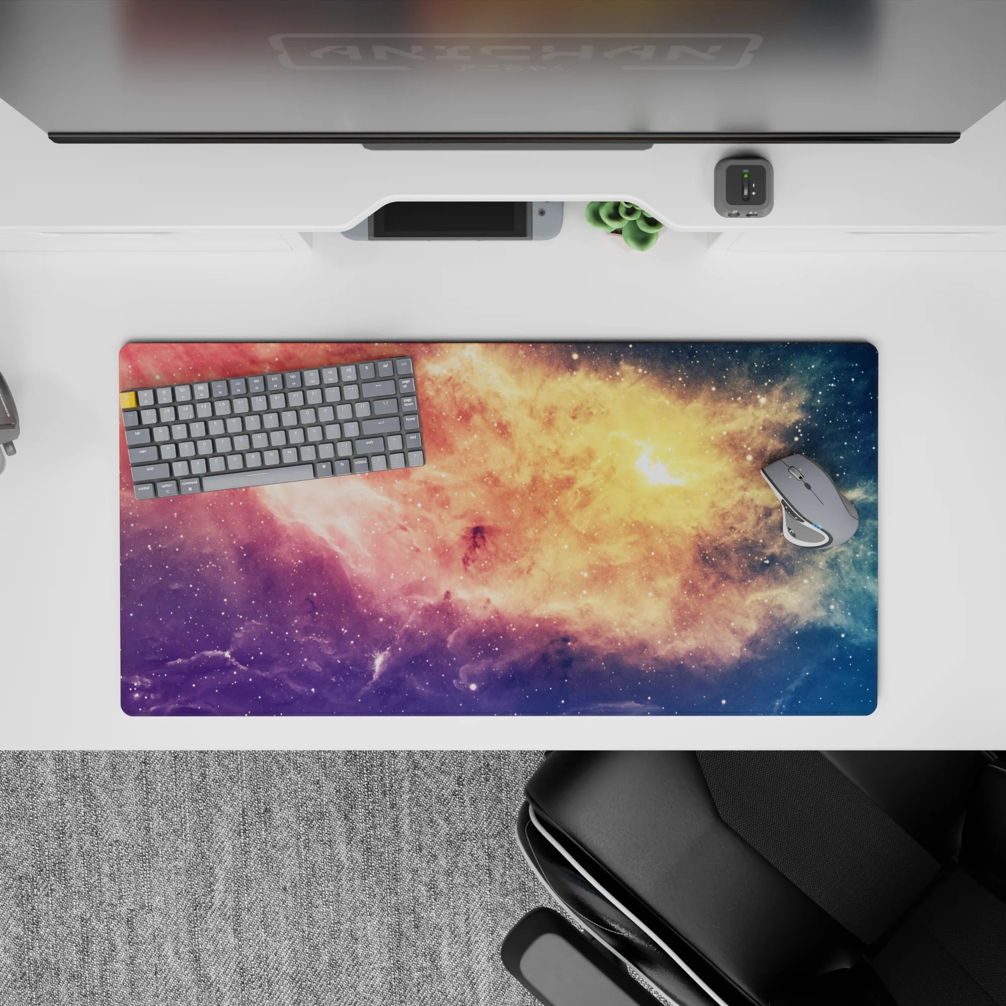 Dreamy candy-sky mouse pad 32x16 inches in peach gold, rosy pink, violet, and deep blue.