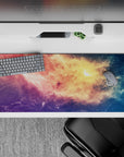 Dreamy candy-sky desk pad 36x16 inches in peach gold, rosy pink, violet, and starry blue.