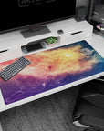 Star-speckled space window desk pad 40x20 inches showing peach clouds fading into violet-blue night sky.
