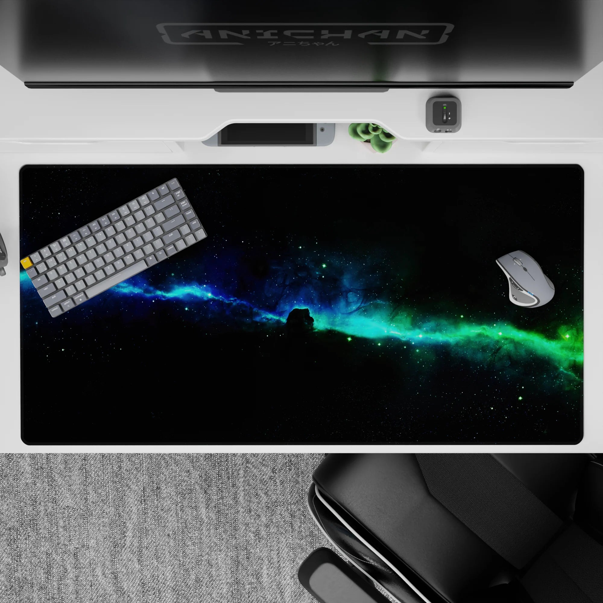 Calming cosmic desk pad 40x20 inches in deep blue, electric teal, and soft green haze.