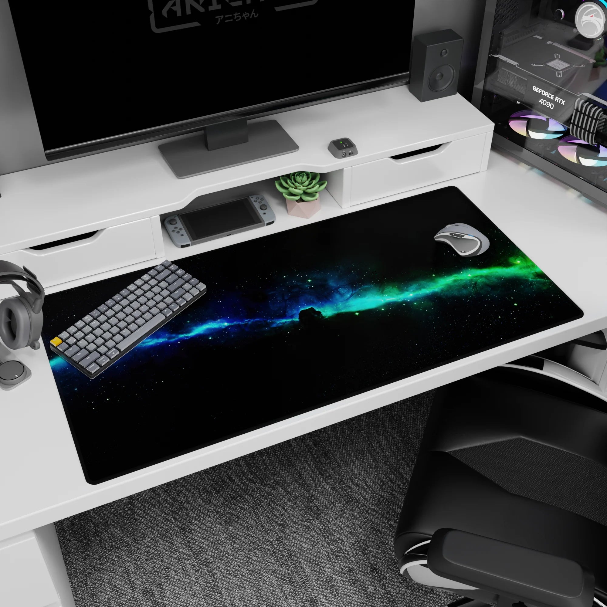 Starry space desk pad 40x20 inches featuring a central nebula band that fades from blue to teal.