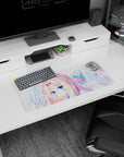 28x12 inches mouse pad showing a golden-blonde anime girl with sapphire eyes among wings and blooms.