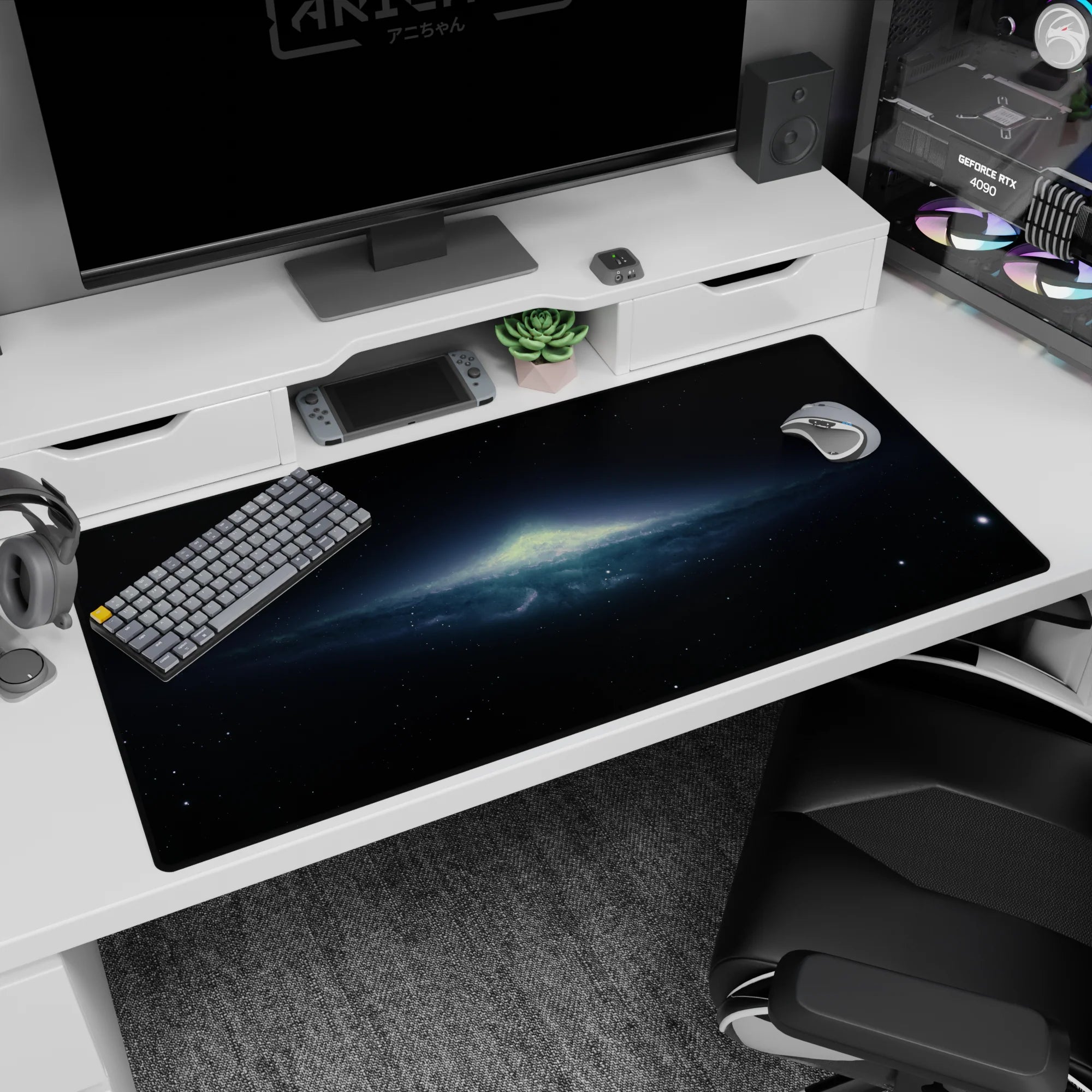 Starry night desk pad 40x20 inches featuring a central pale green aurora glow over a blue cosmic haze.