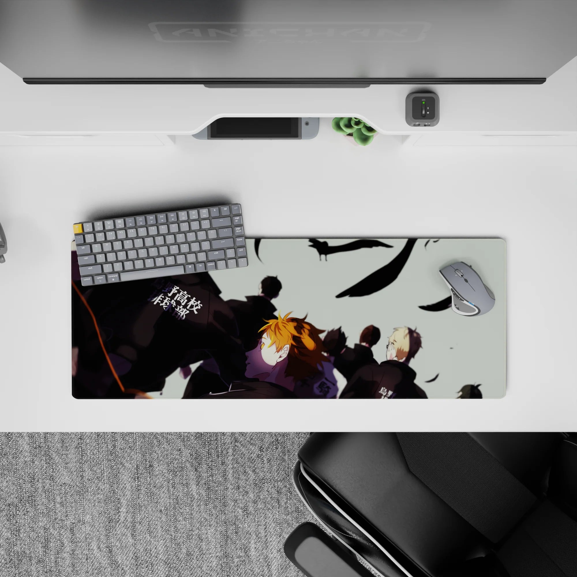 Orange hair, pale sky, and swirling black feathers set a focused pre-match mood on 32x12 inches mouse pad.