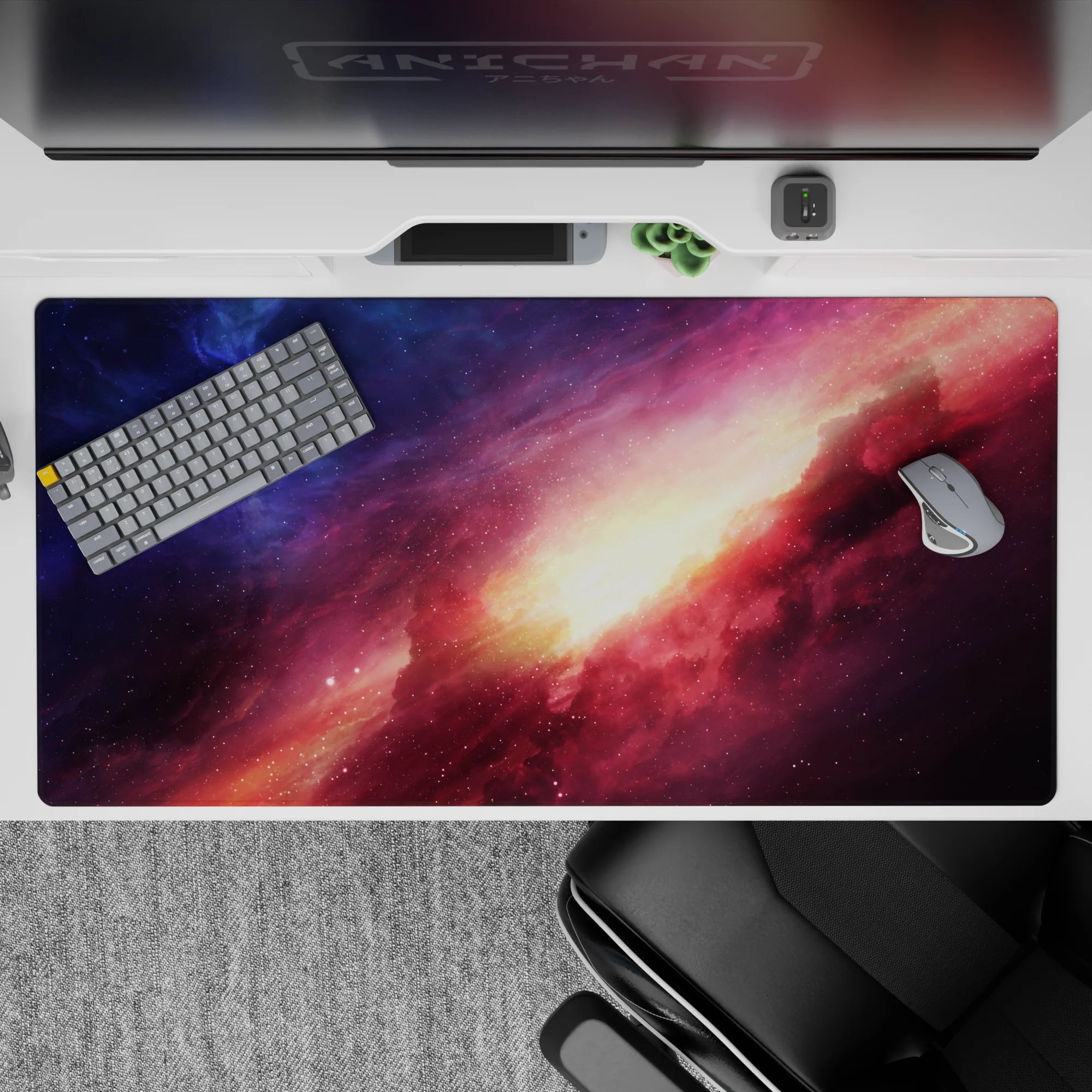 Galaxy-themed desk pad 40x20 inches with indigo, violet, and peach nebula design for smooth workspace.