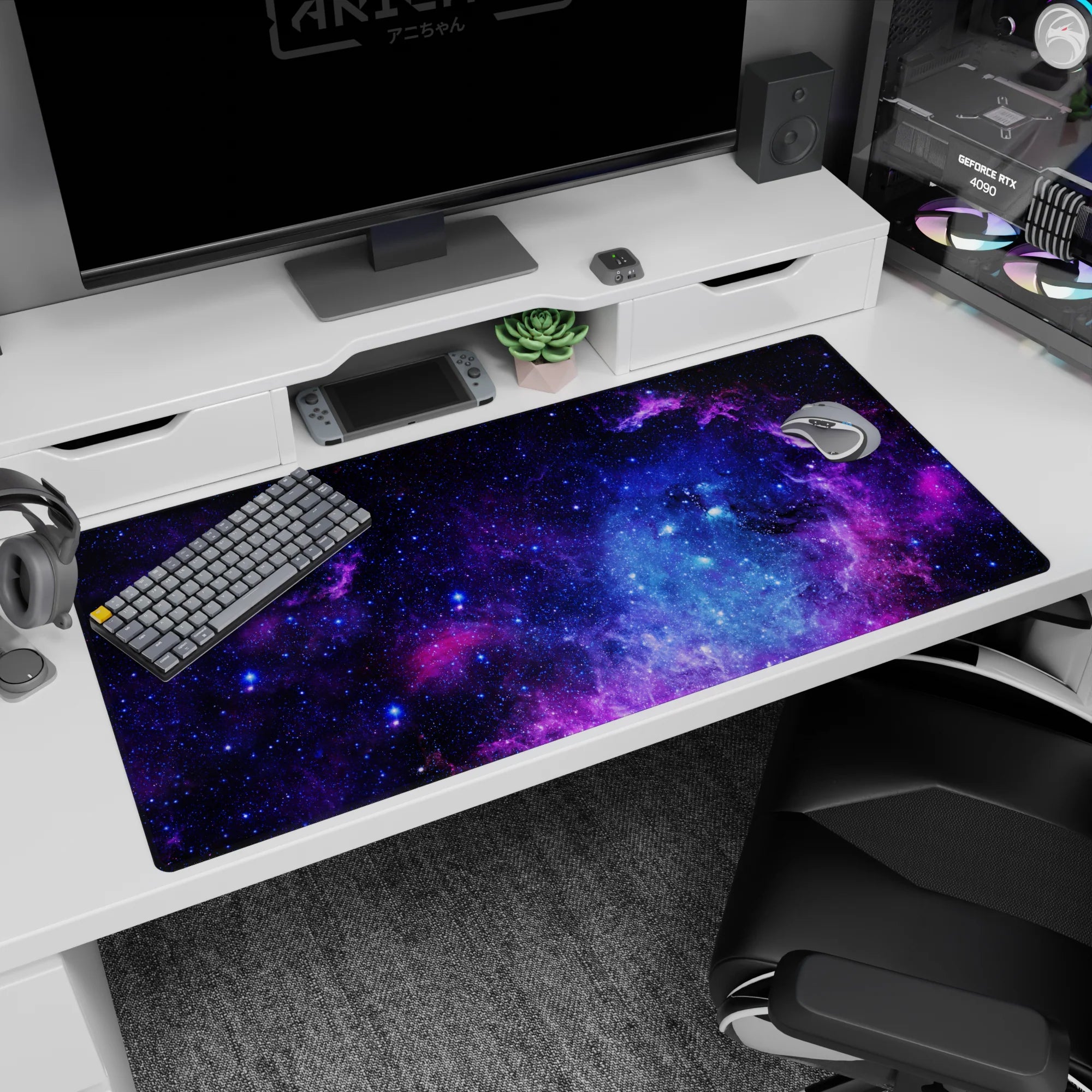 Galaxy-themed desk pad 40x20 inches with swirling blues, purples, and starry details for a cosmic workspace.