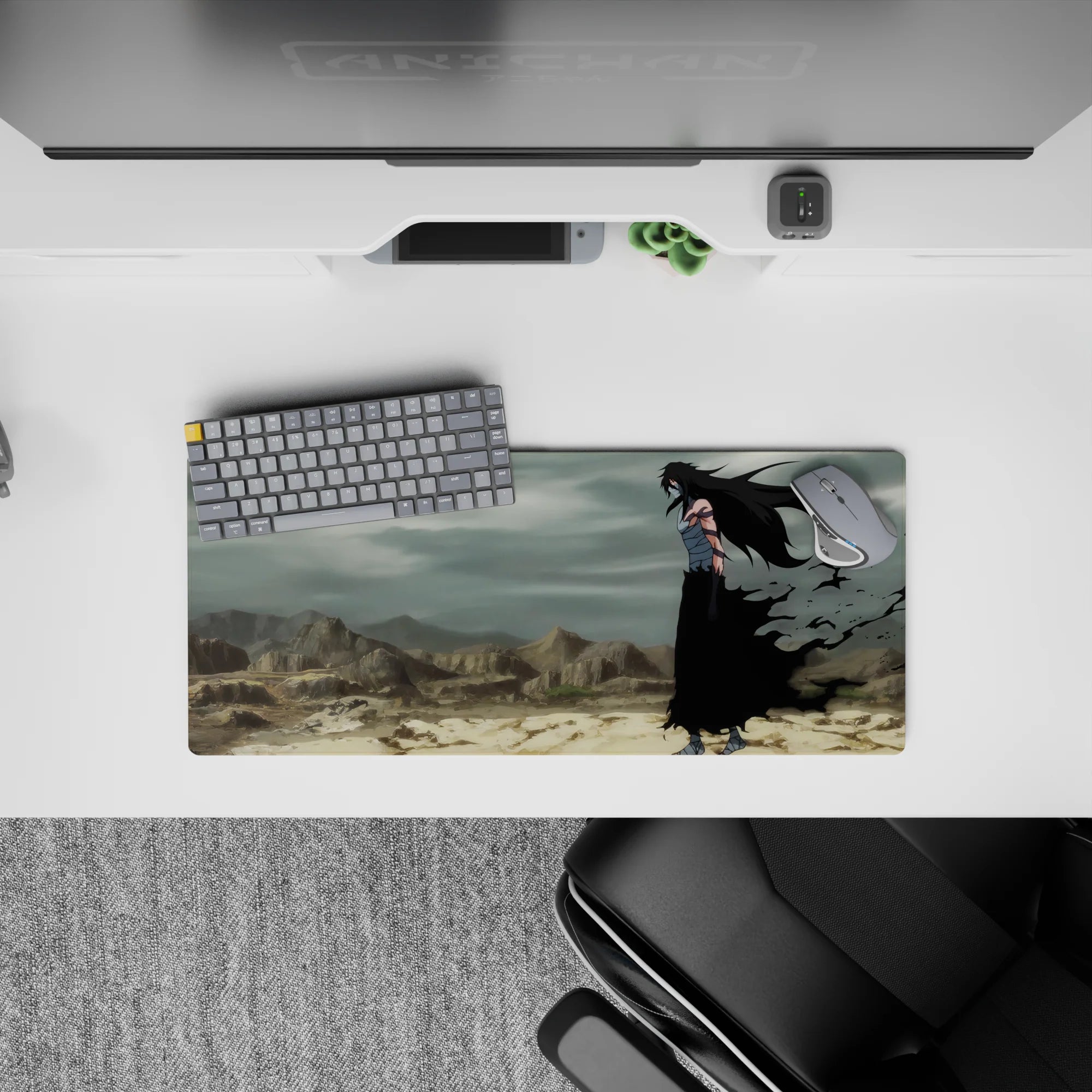 Ichigo Kurosaki in Hollow form from Bleach on 28x12 inch mouse pad; stormy wasteland backdrop with intense red eyes.