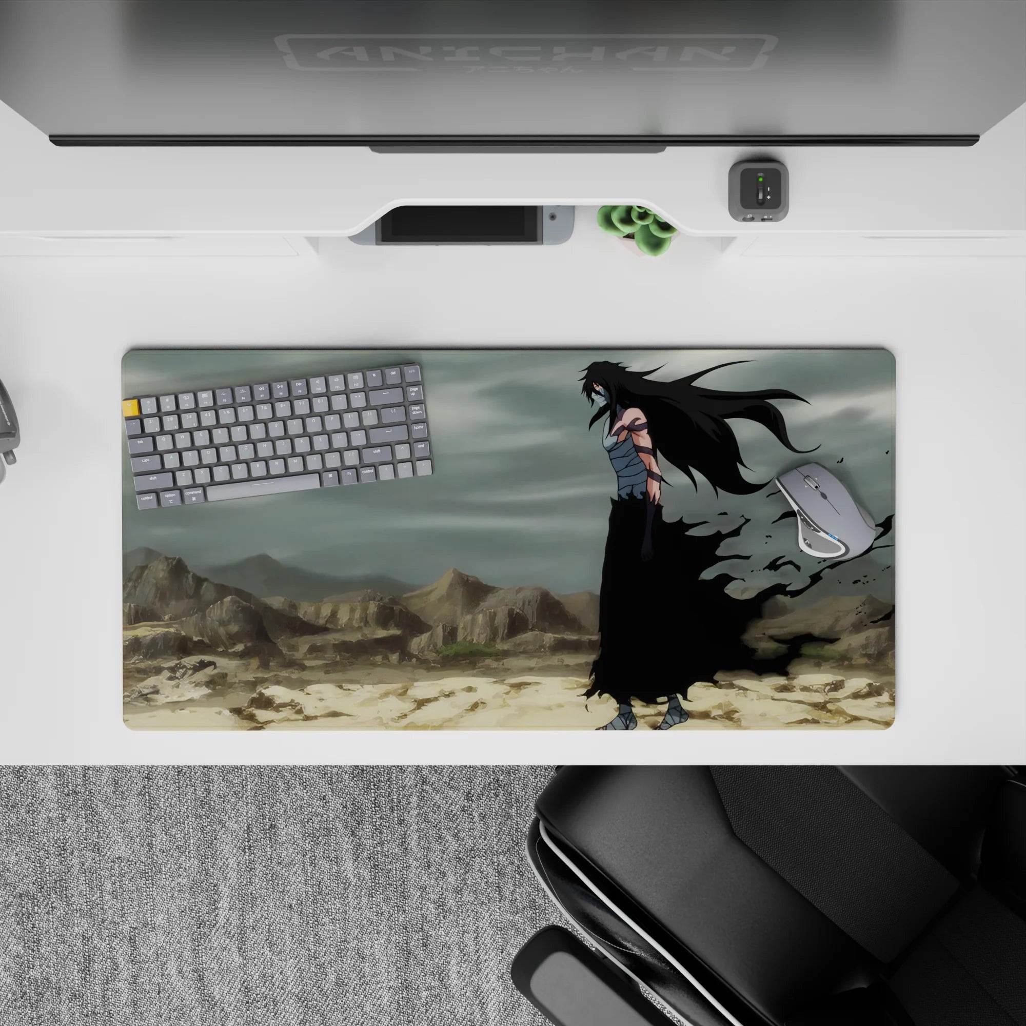 Ichigo Kurosaki in full Hollow form from Bleach on 32x16 inch anime mouse pad, amid a desolate wasteland, exuding intensity.