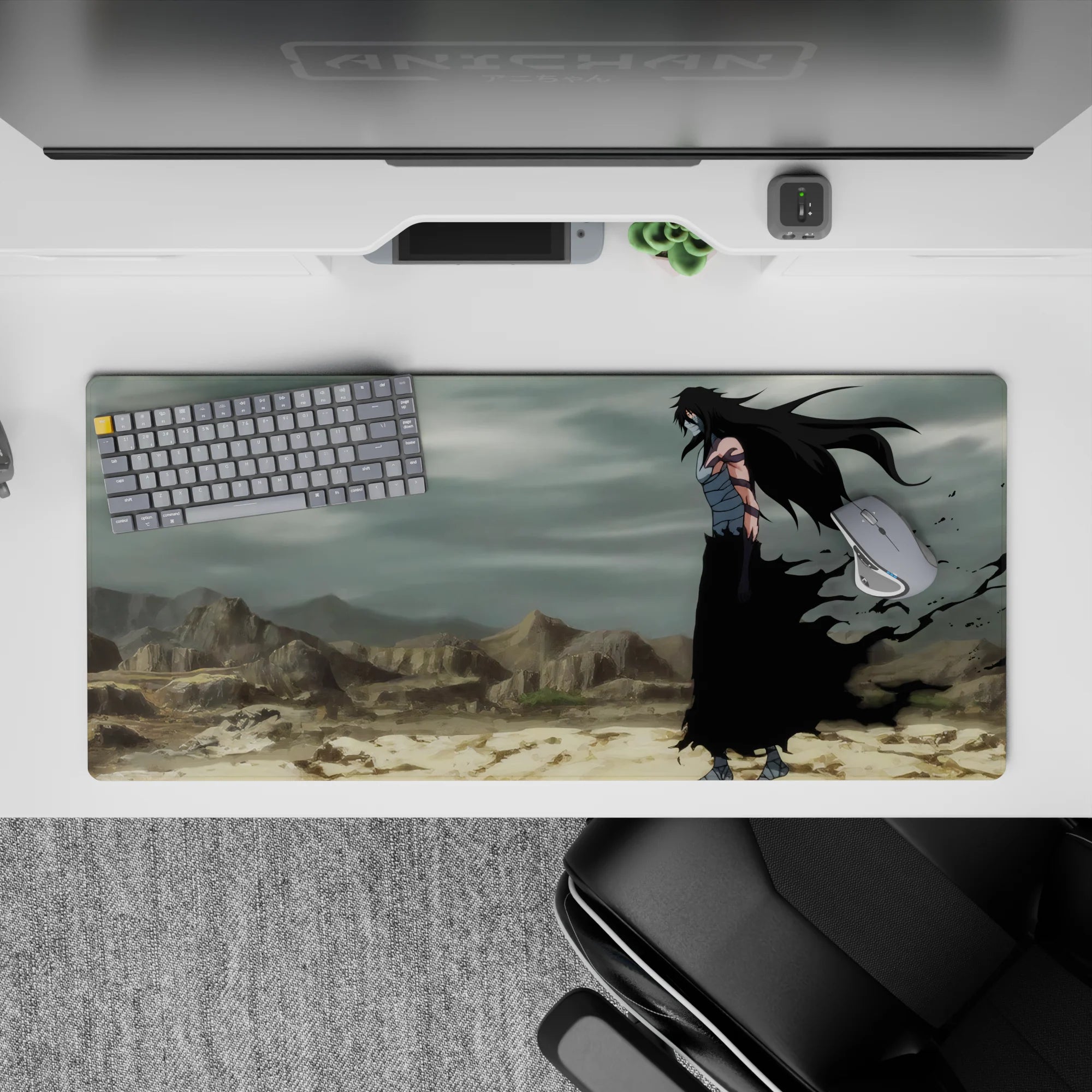 Ichigo Kurosaki in full Hollow form from Bleach on a 36x16 inch anime desk pad, standing in a desolate wasteland.