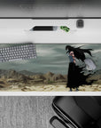 Ichigo Kurosaki in full Hollow form from Bleach on a 36x16 inch anime desk pad, standing in a desolate wasteland.