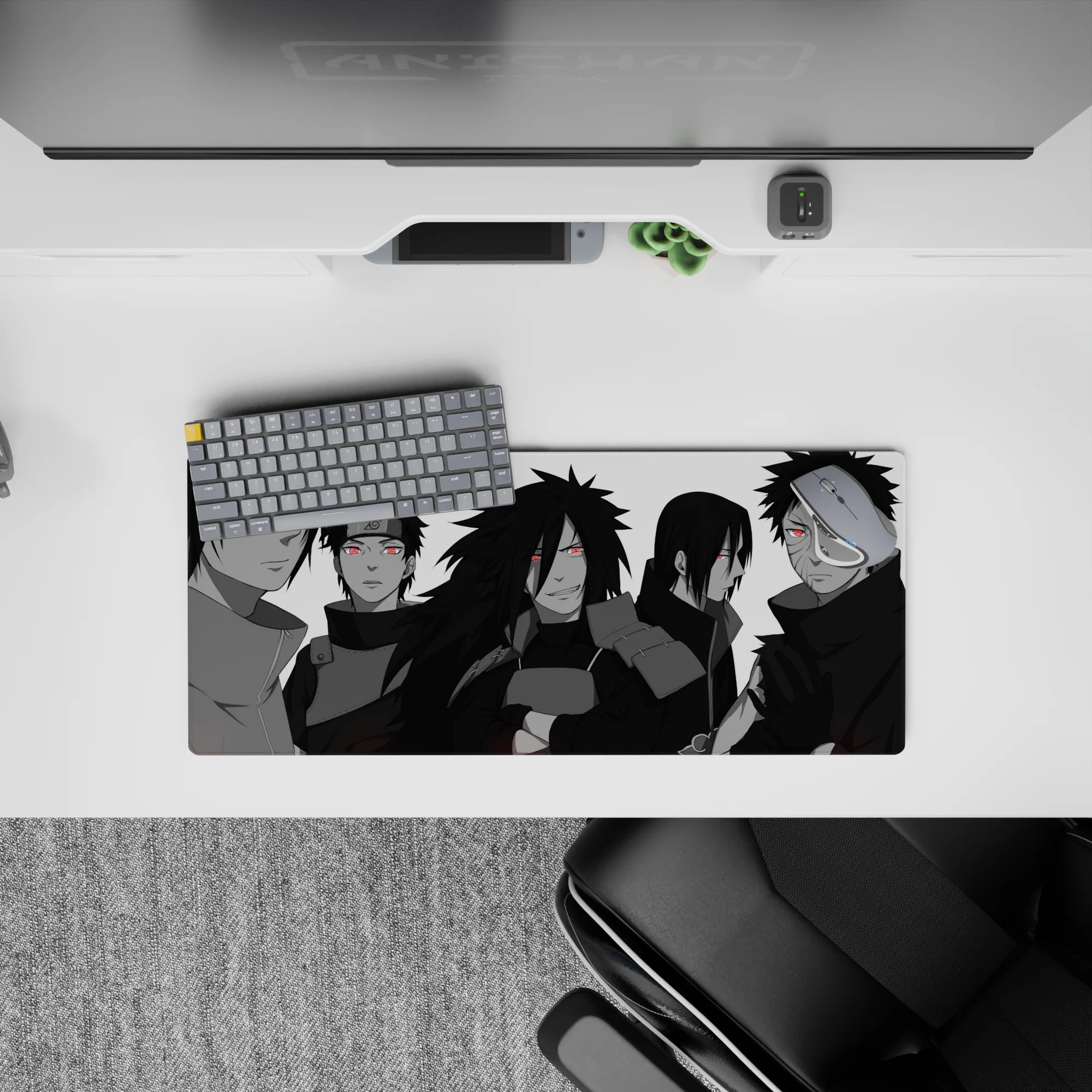 28x12 inches anime mouse pad in slick grayscale with bright red Sharingan pops and a purple Rinnegan.