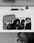 28x12 inches anime mouse pad in slick grayscale with bright red Sharingan pops and a purple Rinnegan.