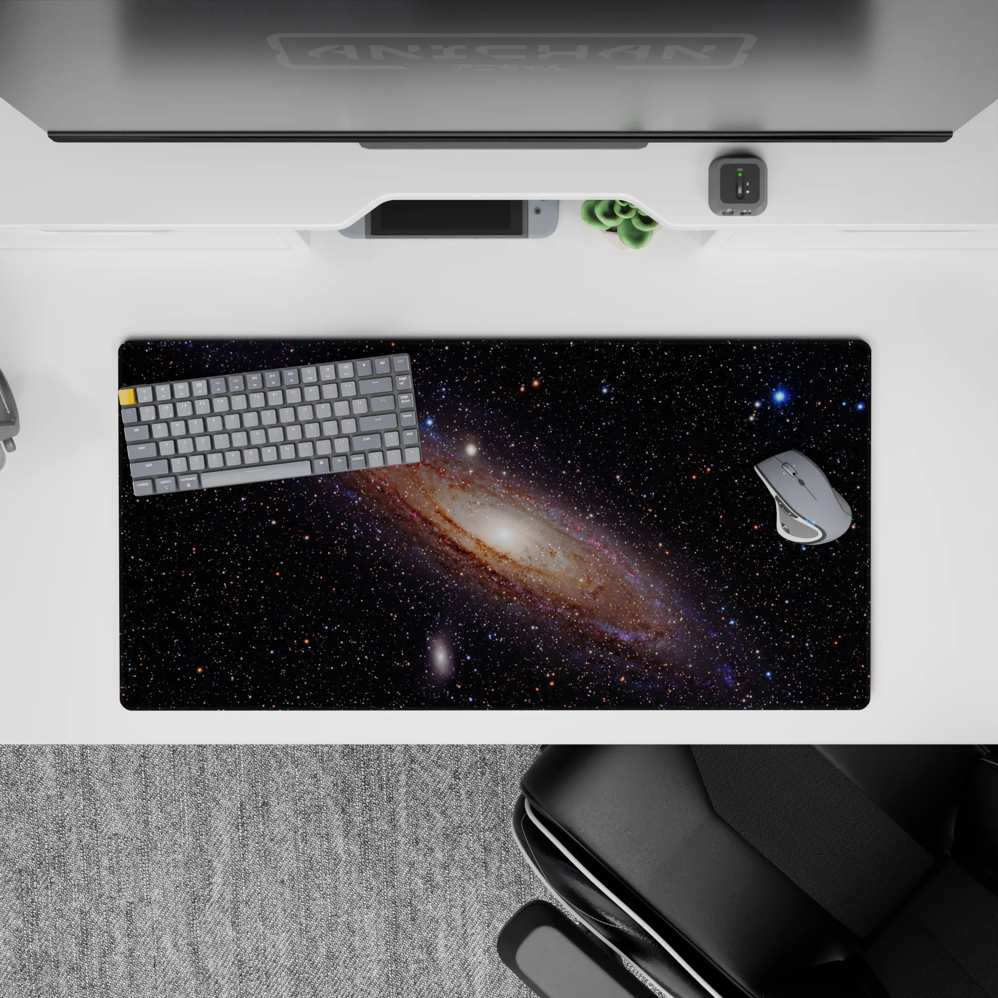 Calming deep black mouse pad 32x16 inches with creamy glow, wispy blues, violet haze, amber sparks.