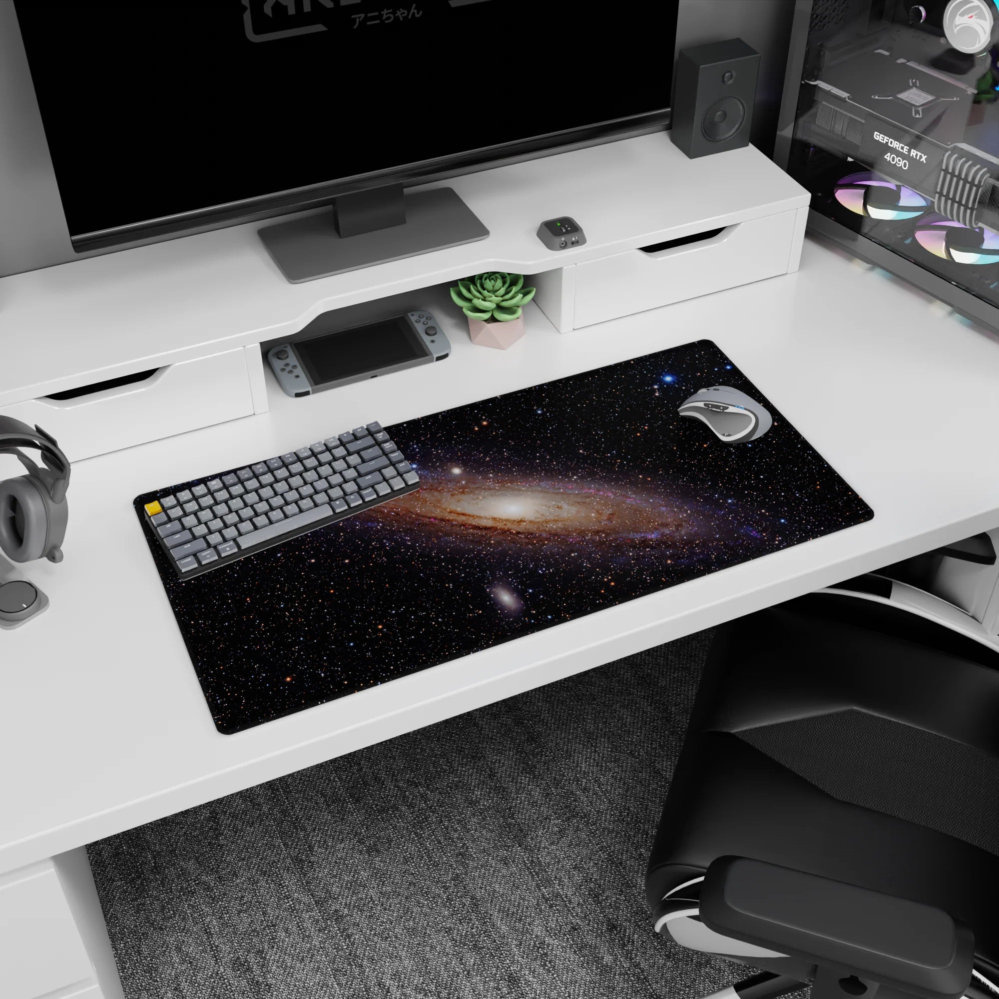 Dreamy spiral nebula scene mouse pad 32x16 inches featuring tiny stars around a luminous galaxy center.