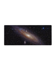 Spiral galaxy mouse pad 28x12 inches with starry deep space design and glowing core.