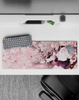 32x12 inches anime girl desk mat in blush pink and navy tones, cozy sakura highlights, calm vibe.