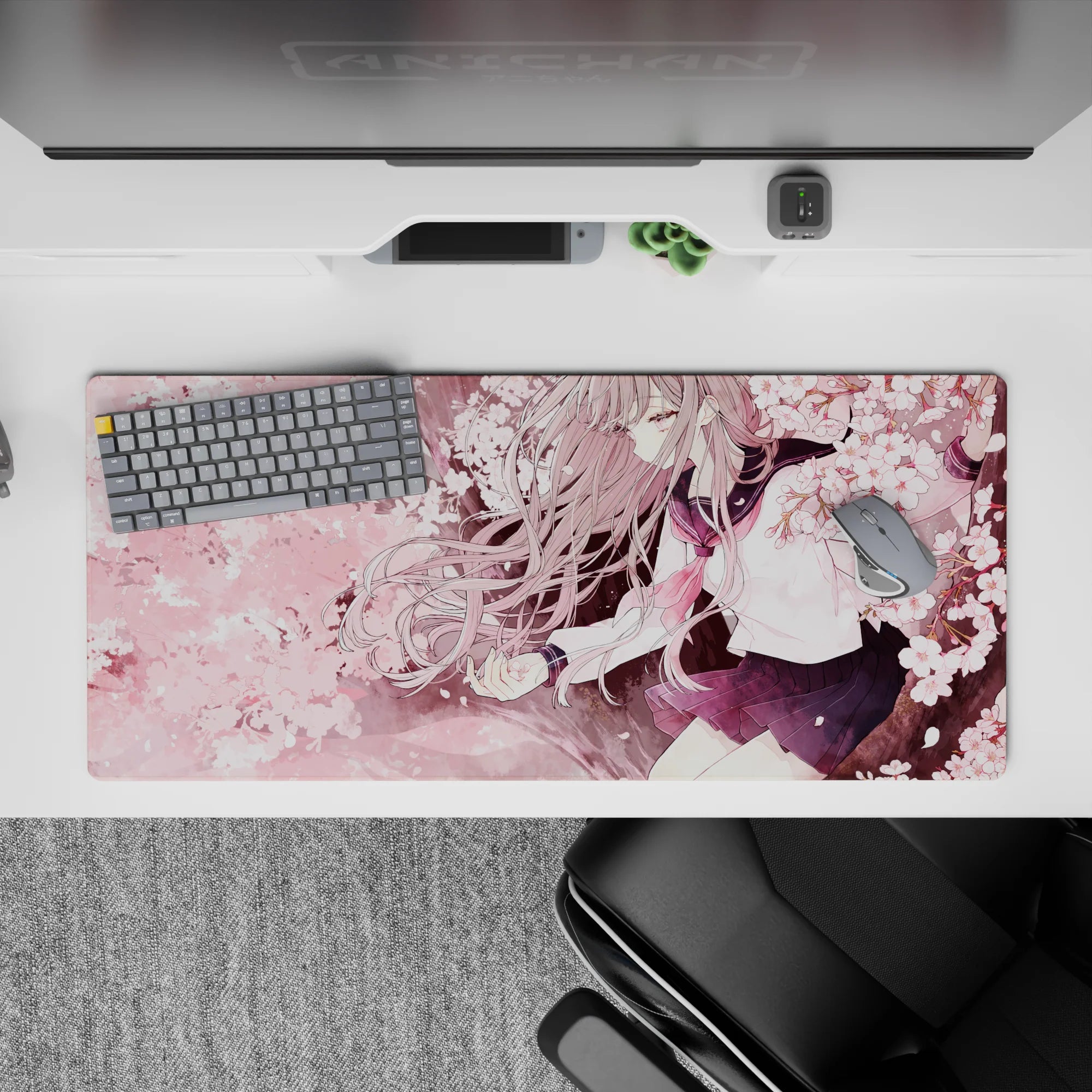 Blush-pink sakura desk pad 36x16 inches, calm cozy anime aesthetic with warm highlights and smooth glide.