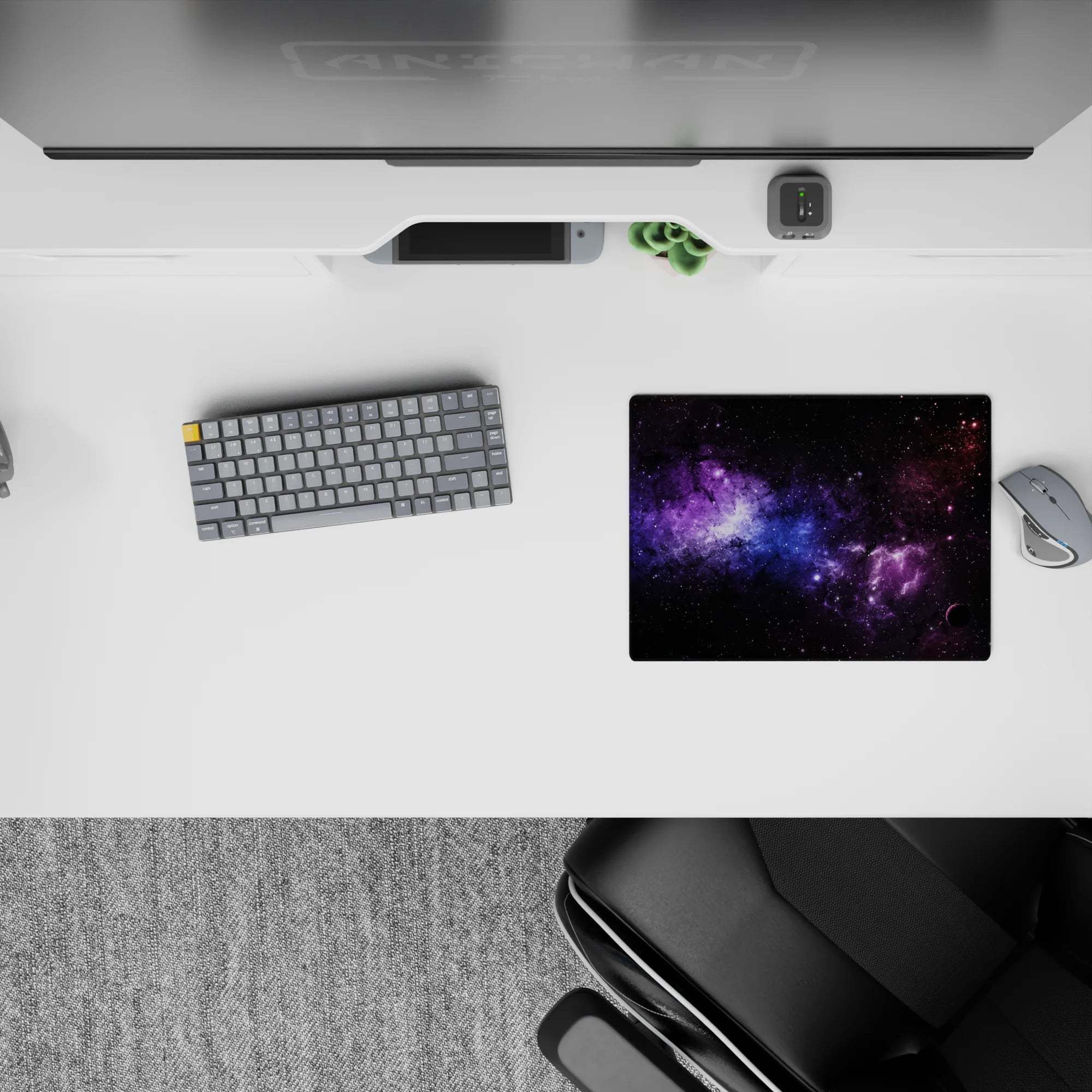 Cosmic themed classic mouse pad 14x10 inches with swirling black nebula, violet haze, and soft blue stardust.