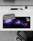 Galaxy inspired desk mouse pad with black, violet, and blue nebula design, 28x12 inches large surface.