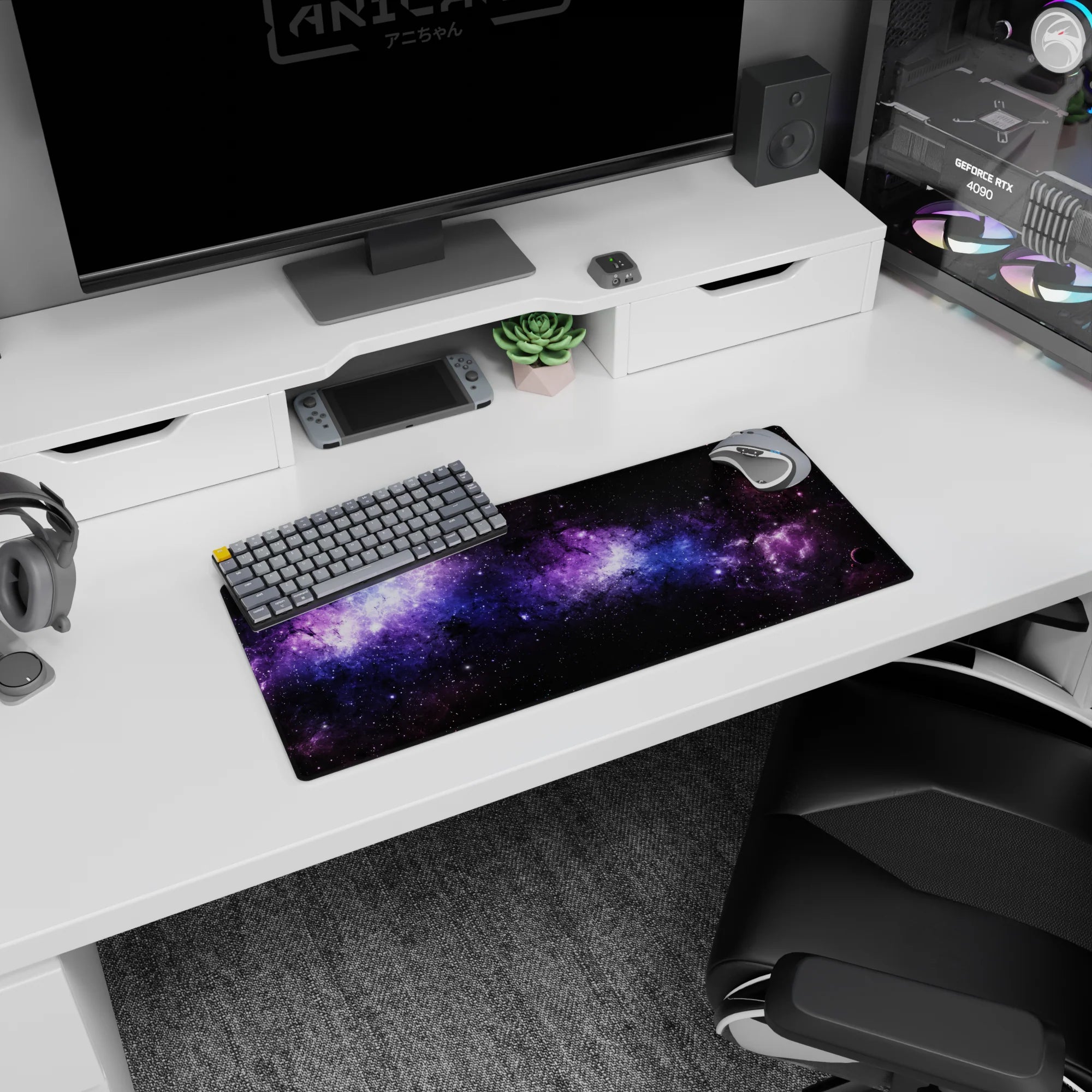 Cosmic design mouse pad with swirling nebula clouds and violet stardust pattern, size 28x12 inches.