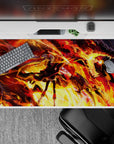40x20 inches anime desk pad in orange, gold, and crimson firelight with bold high-contrast chaos.