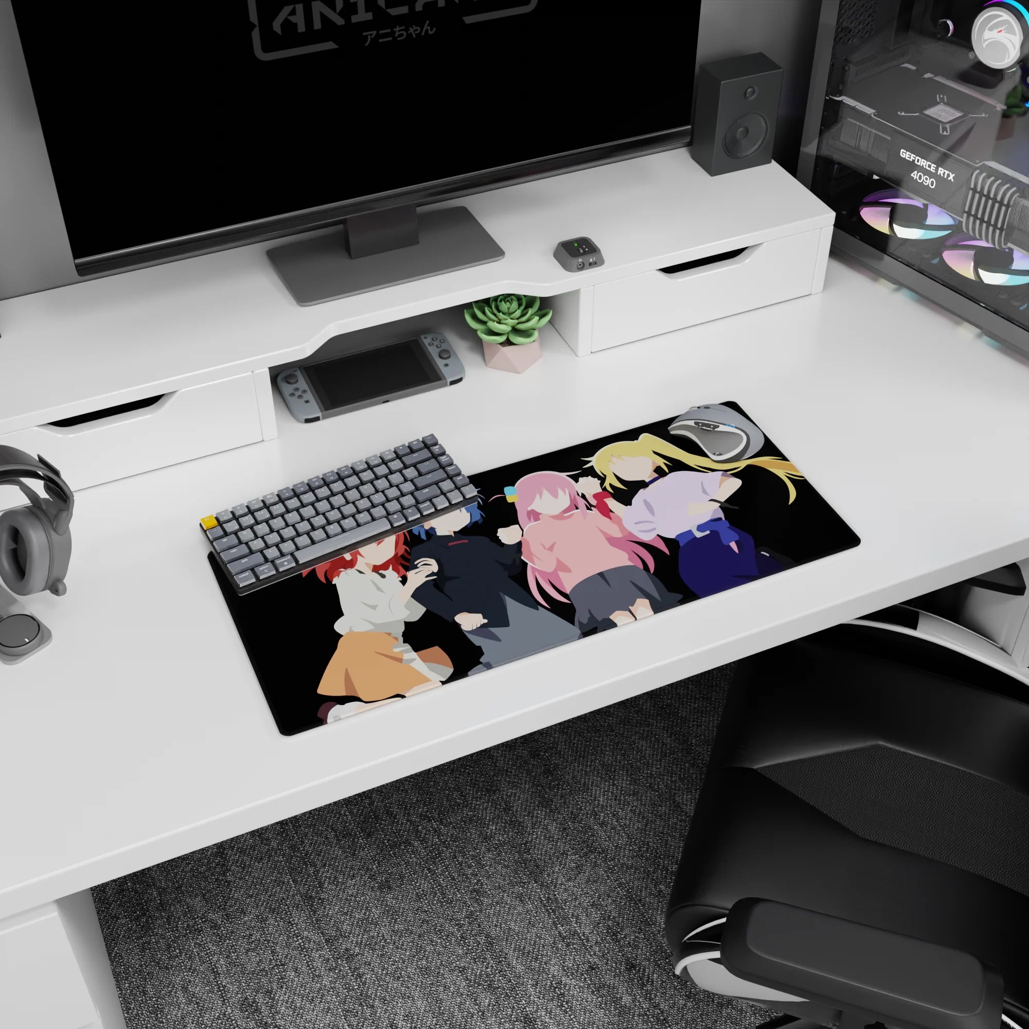 28x12 inches anime girl mouse pad showing a pink-haired girl cheering beside three friends.