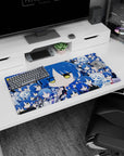 Deadpan blue-haired chibi anime girl front and center on mouse pad 32x16 inches, half-lidded yellow eyes.