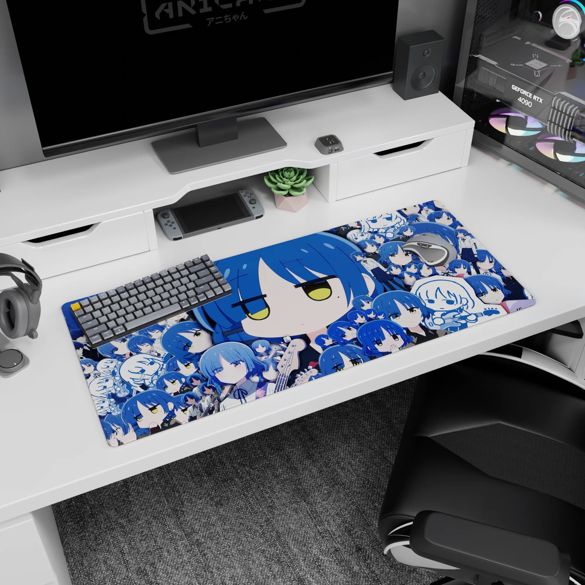 36x16 inches anime girl desk pad with big blue-haired chibi face, half-lidded yellow eyes and sleepy mini portraits.