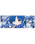 Collage-style anime girl mouse pad 32x12 inches with blue-haired chibi faces, doodle panels, school uniforms.