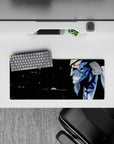 Anime mouse pad 28x12 inches featuring Bleach's Kenpachi Zaraki with blood and shadows, exuding raw intensity.