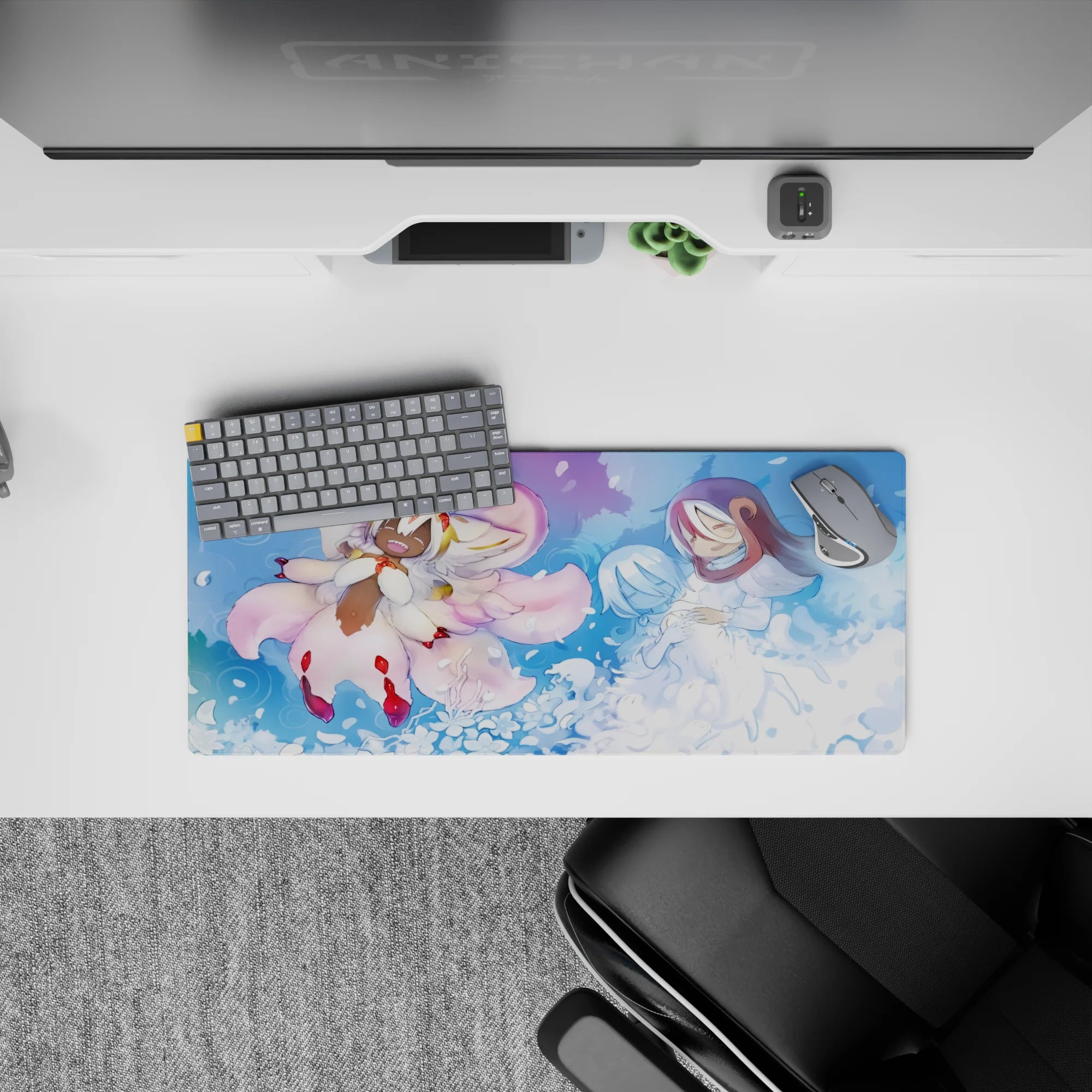 28x12 inches anime mouse pad in misty blues and blush pink, serene mood with swirling petals and soft waves.