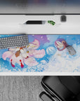 36x16 inches anime desk pad in dreamy blues and blush pink, serene misty glow with swirling petals.