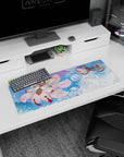 32x12 inches anime mouse pad showing hooded figure holding blue-haired companion beside fox-like spirit.