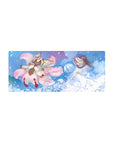 28x12 inches anime mouse pad with fox-like spirit and hooded couple in a dreamy blue petal scene.