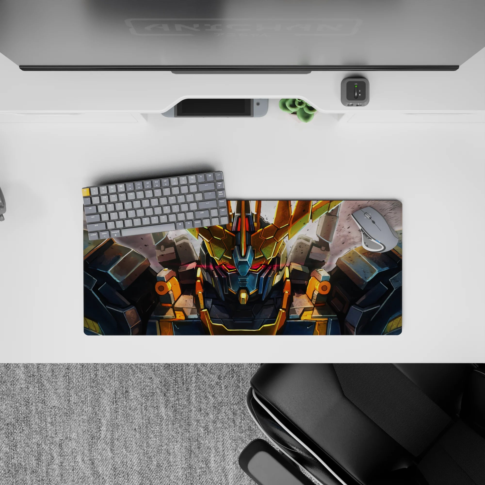 28x12 inches anime mouse pad in steel gray with gold V-fin horns and a red glowing visor, intense mood.