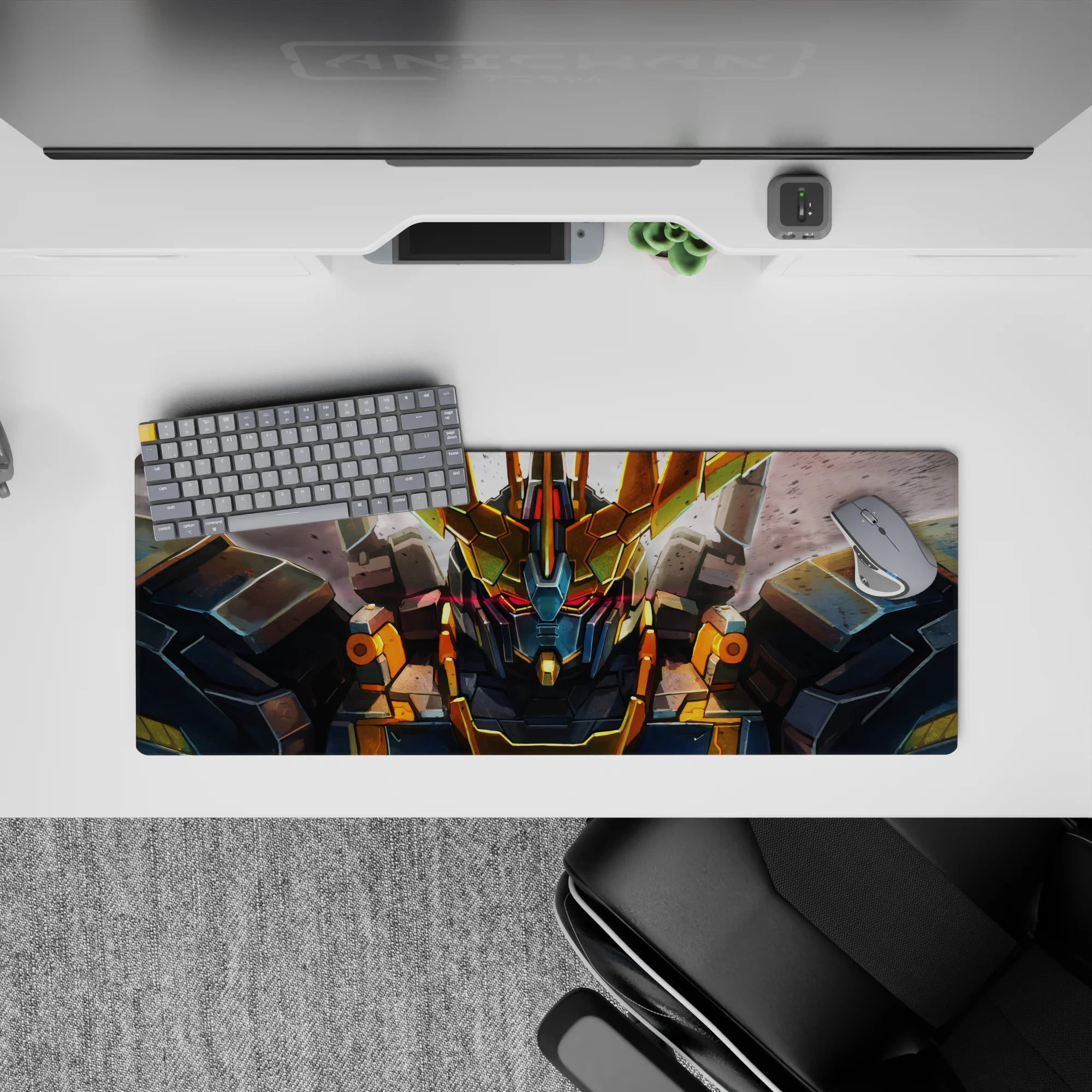 32x12 inches anime mouse pad in steel gray with gold V-fin and red visor glow, intense battle mood.