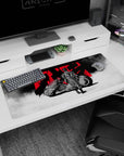36x16 inches anime desk pad showing a back-turned biker in worn leather beside a sleek black bike.