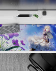 Dreamy sapphire sky desk pad 36x16 inches with teal-eyed anime girl, violet accents, drifting sparkles.