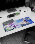 32x12 inches anime girl mouse pad showing a blonde girl in billowing white skirts beside big purple blooms.
