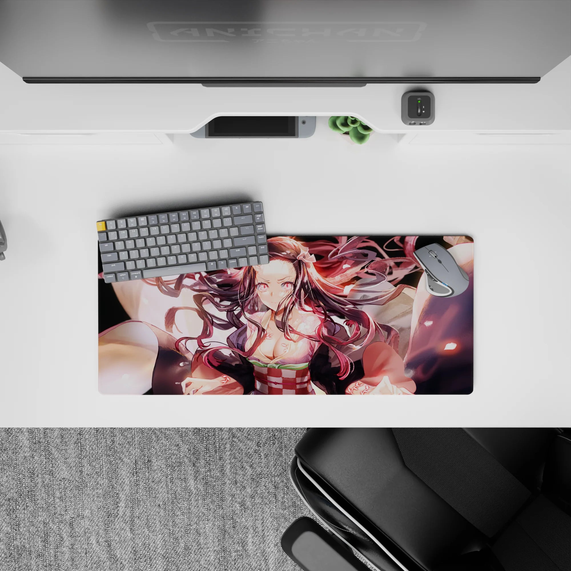 Nezuko-themed mouse pad 28x12 inches, showcasing her demon form from Demon Slayer with glowing pink eyes and fiery hair.